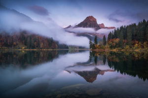 Switzerland, Glarus, mountain lake in the fog in the morning Switzerland, Glarus, mountain lake in the fog in the morning